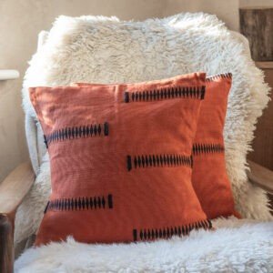 Handwoven Rust Cushion with Tribal Motif