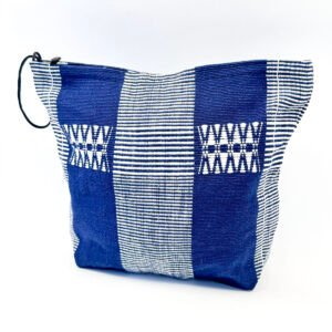 Handwoven zip pouch in [colour], handcrafted from cotton using traditional Naga weaving techniques, featuring a secure zip closure